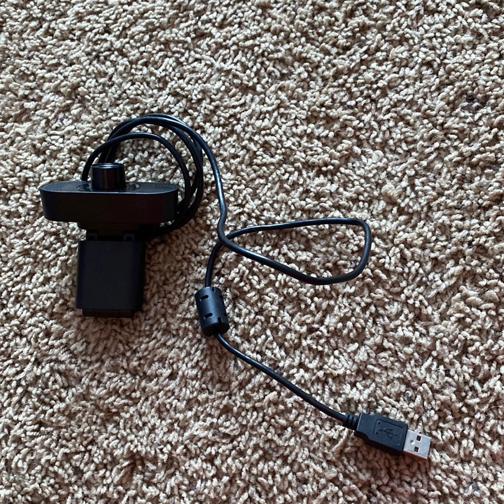 WebCam with microphone that attaches onto any device that has a USB plug-in